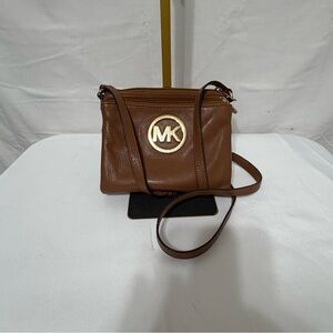 Michael Kors brown leather crossbody bag with gold-tone hardware